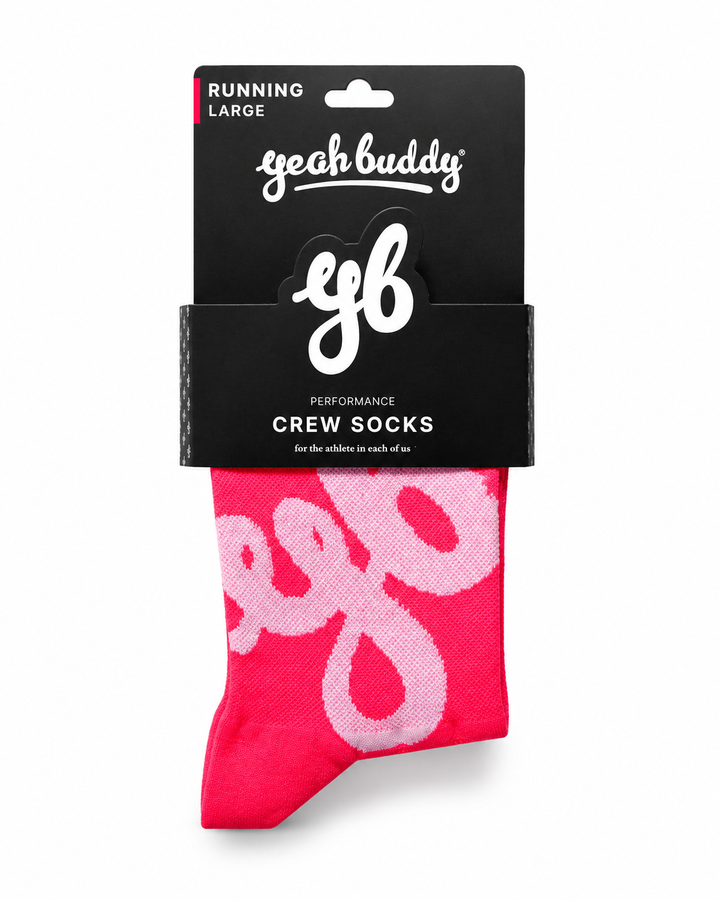 Yeah Buddy pink performance running crew socks with a light pink yb monogram, in branded packaging
